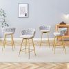 A set of 4 rotating bar stools, equipped with breathable linen cushions - beige seats with golden metal legs